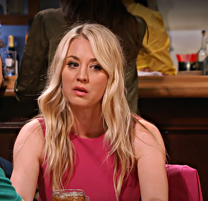 Penny wearing pink dress 