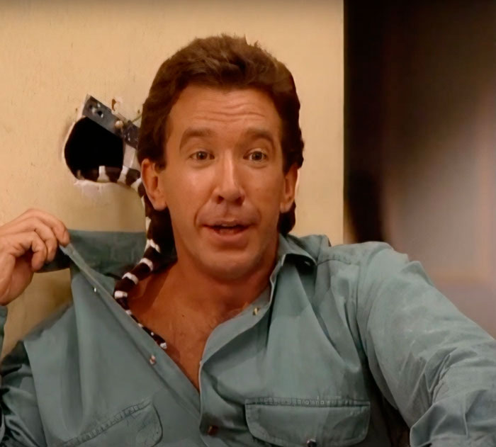 Tim Taylor with the snake on his neck 