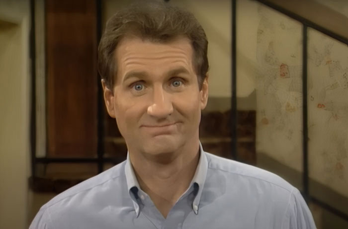 Al Bundy wearing blue shirt 