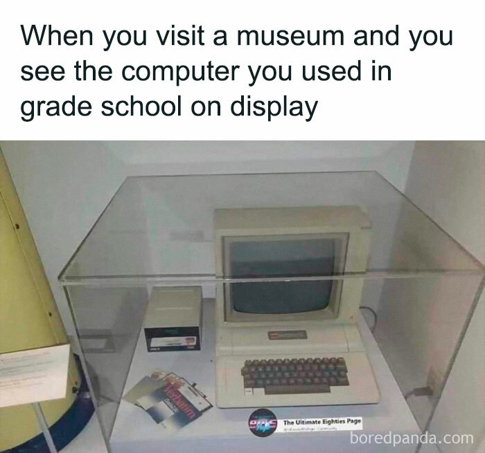 Vintage computer exhibit under glass with a humorous caption about nostalgia and feeling old.