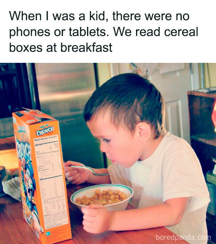Child reading cereal box, humorously highlighting generational differences in entertainment.