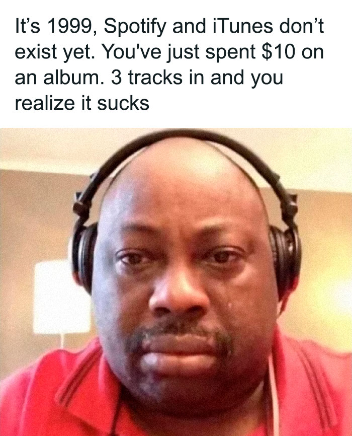 Man with headphones looks disappointed, reflecting on a 1990s album purchase mistake; a relatable old generation meme.