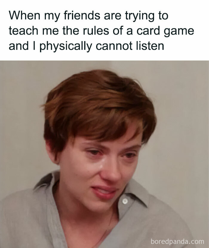 A person looking emotional with text about struggling to learn card game rules; a spicy meme for a smile.