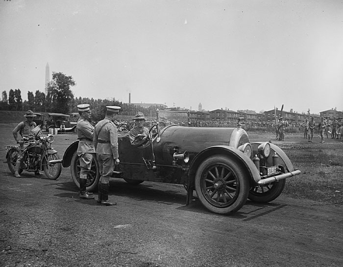 Military Group At The Camp. Washington Monument In The Background