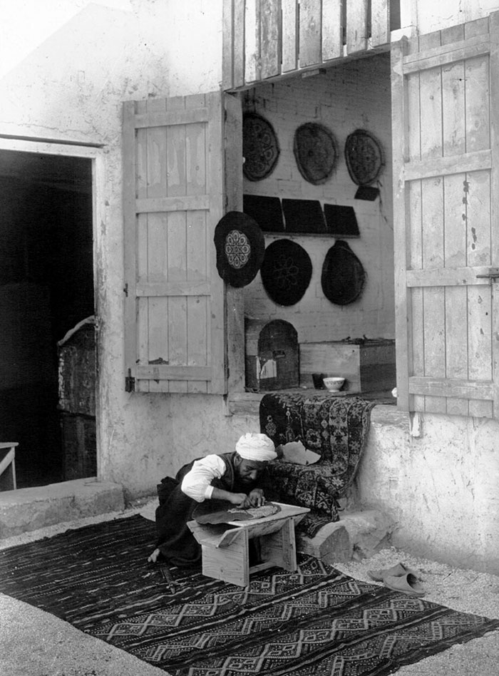 Moroccan Making A Carpet
