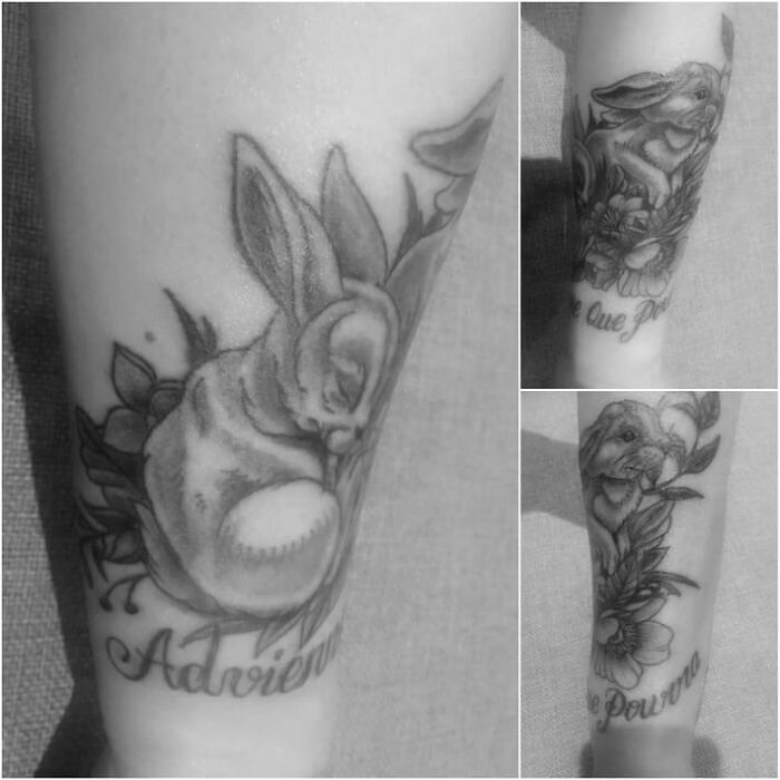 Coolest looking tattoo of a rabbit surrounded by flowers on an arm.