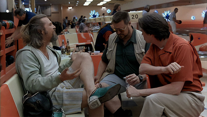 Walter Sobchak speaks by gesturing with his hands