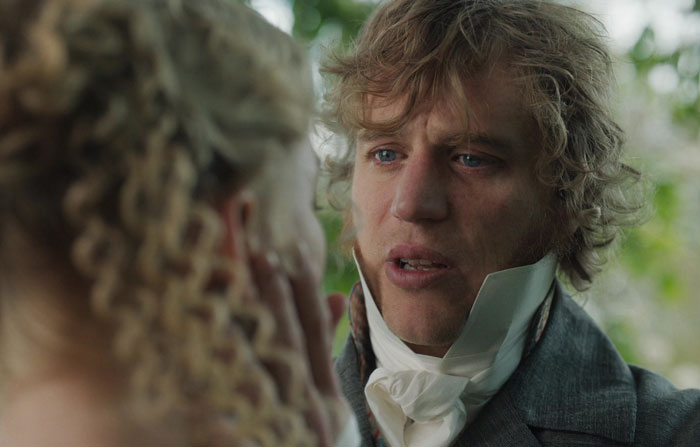 George wearing suite 