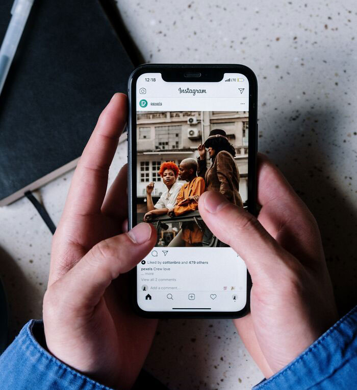 Person Scrolling On Social Media 