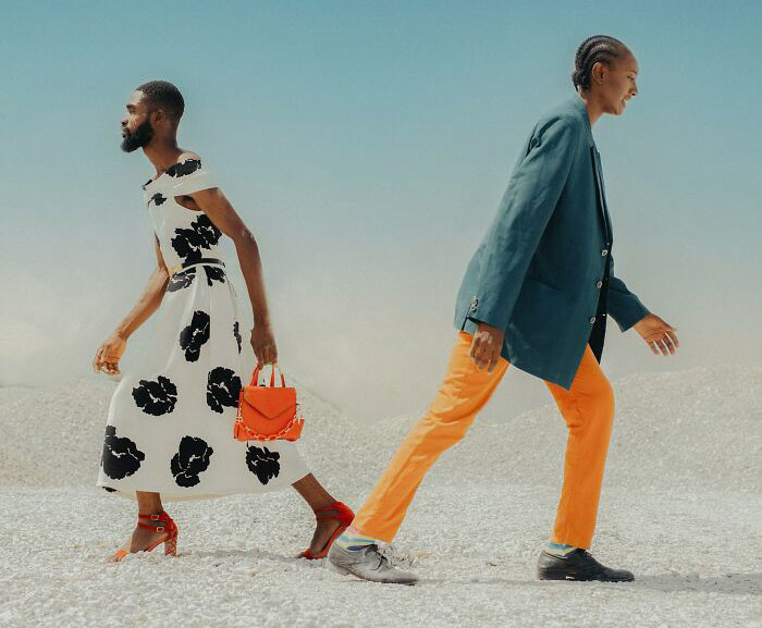 Persons walking from each other