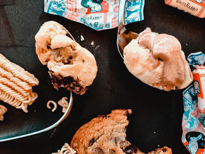 Caramel ice cream on the table spoon 