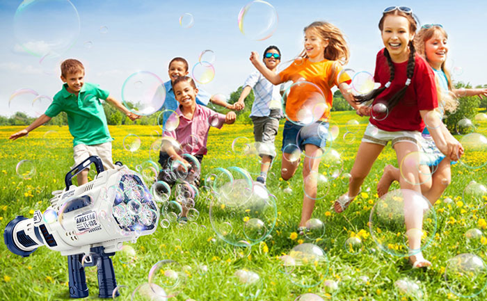 Kids playing with bubble machine 