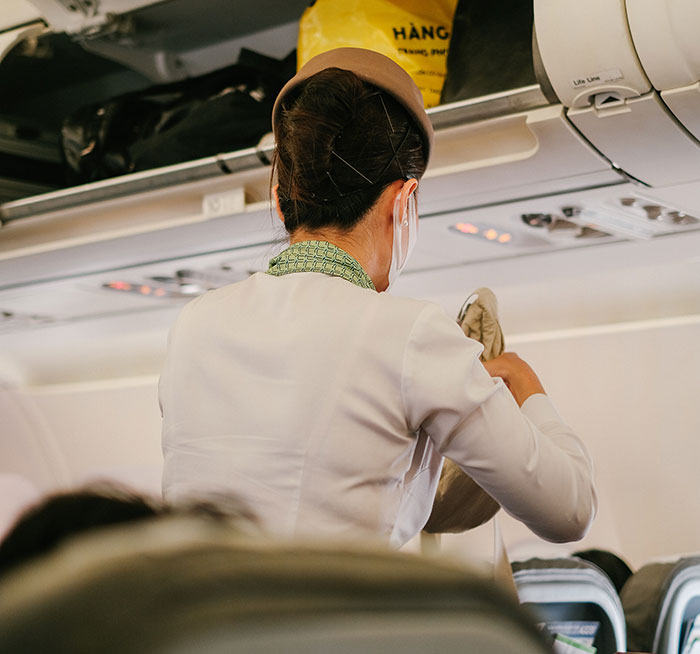 40 Common Etiquette Mistakes To Avoid On Your Next Flight, As Told By Frequent Fliers