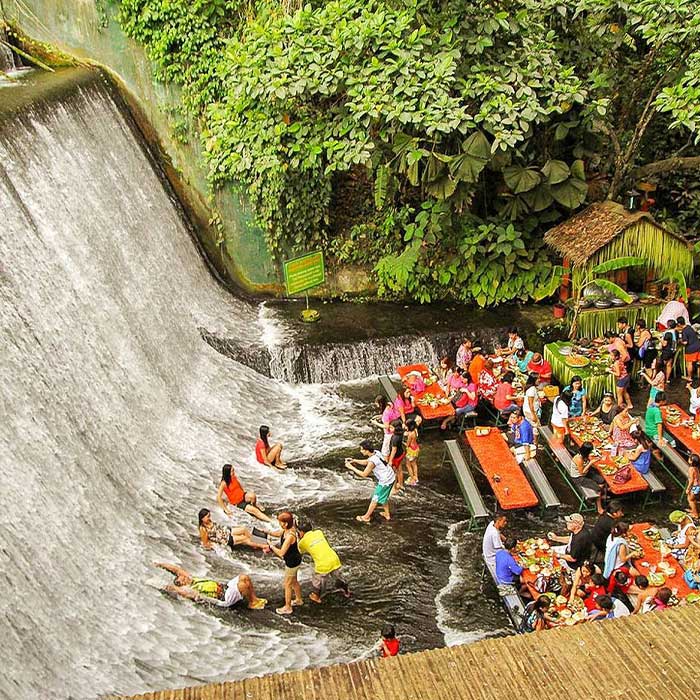 people sitting in waterfall restaurant