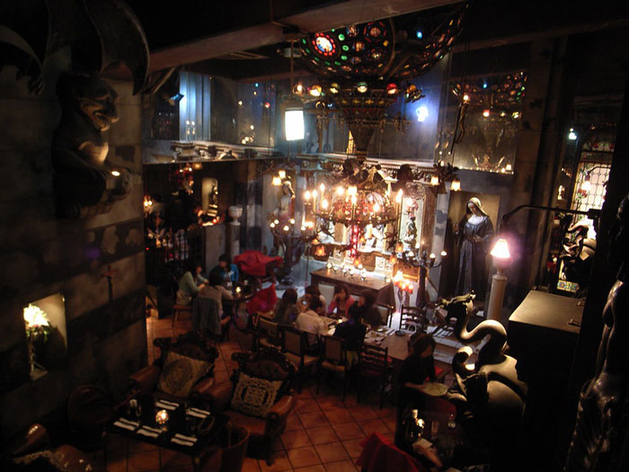 people having dinner in the center of the church