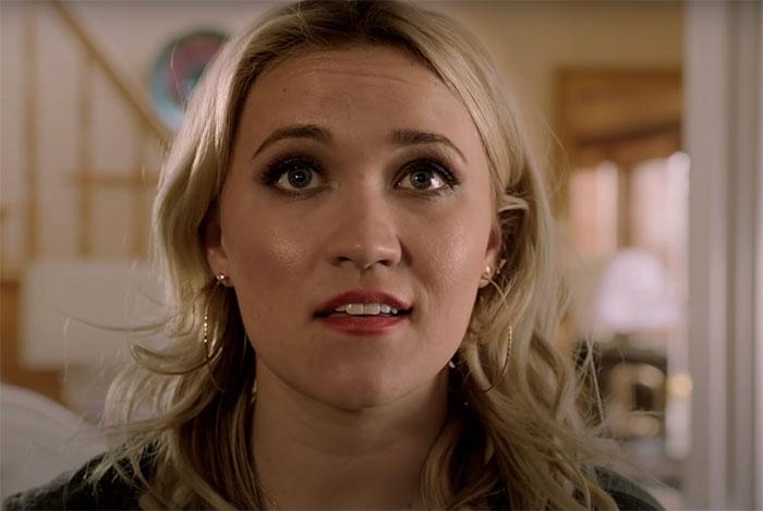 Roxy smiling and looking in Almost Family