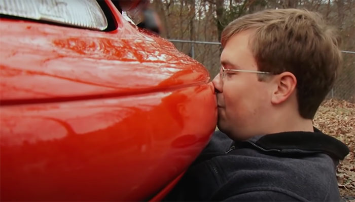 Person kissing car in My Strange A*******n