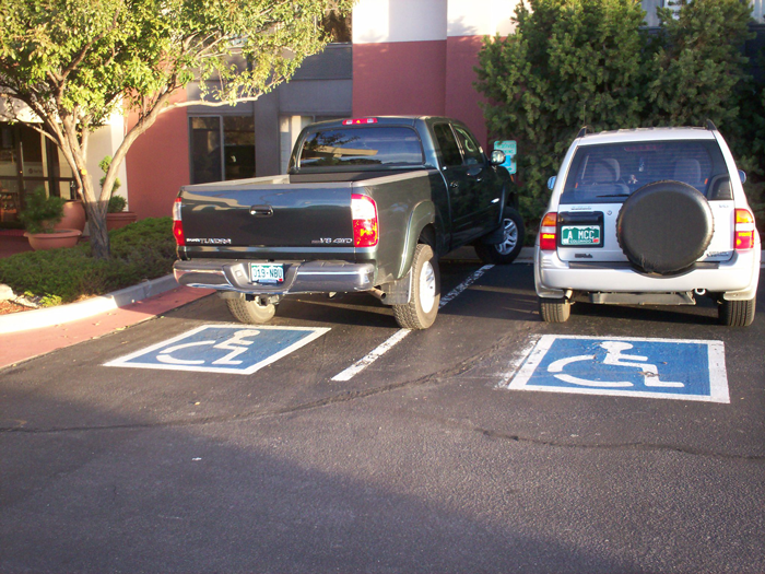 Man Shouting At A Person For Legally Using A Handicapped Parking Spot Gets Instant Karma From A Nearby Cop