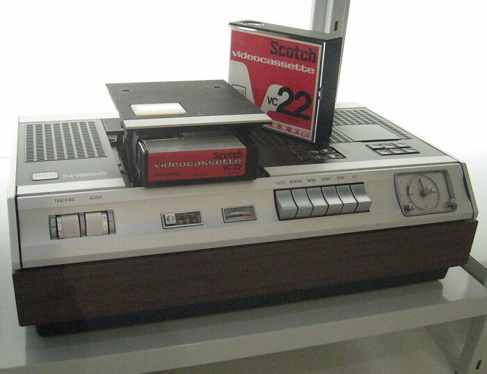Vintage videocassette player with Scotch VC22 tape, an iconic old gadget and trendsetter of its time.