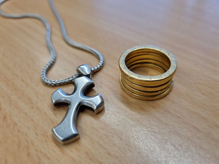 Of Course My Wedding Ring. And The Silver Necklace With The Cross My Wife Gave Me Many Many Years Ago At The Beginning Of Our Marriage. Still Looks Good. I Wear Them Always (Except In This Pic)