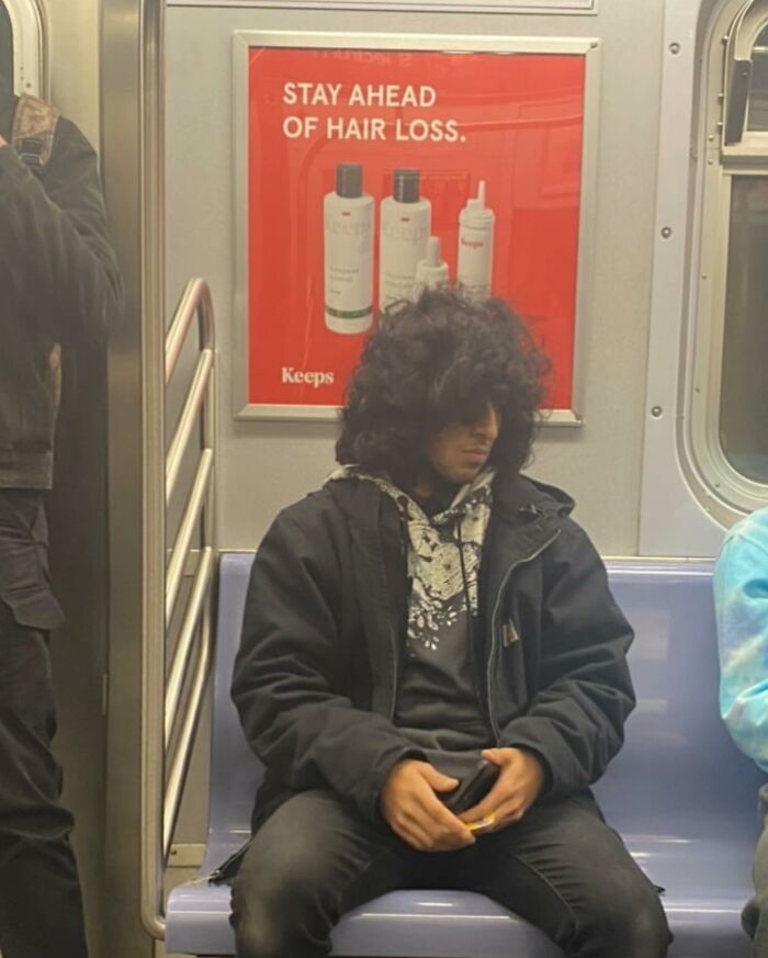 Subway-Signs-Resemble-Sitting-People