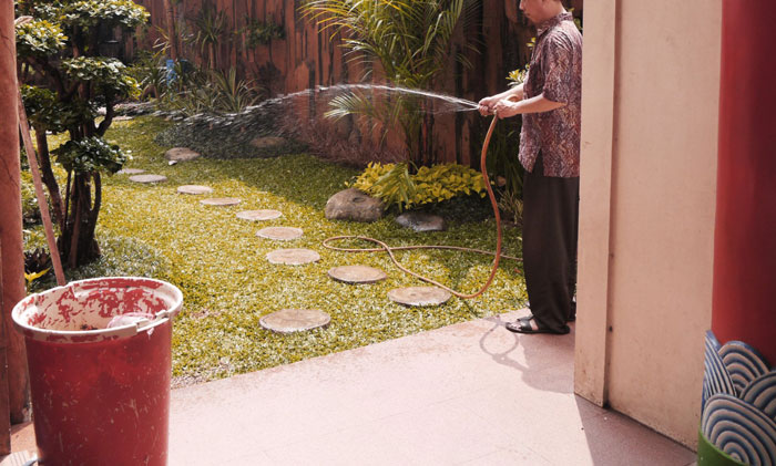 Man Develops An Unlikely Friendship With 14 Y.O. Neighbor After Spraying Him With Water For Walking Across His Lawn Daily