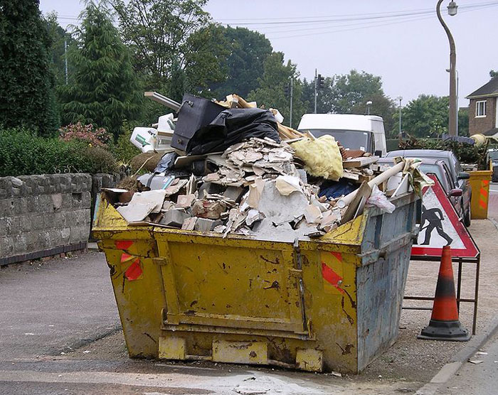 Woman Executes Masterclass In Petty Revenge After Neighbors Keep Placing Their Trash Can In Front Of Her Garage For 1.5 Years