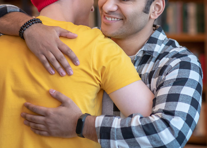 "Am I The Jerk For Hugging My Brother In Front Of My Wife, Despite Knowing That Makes My Wife Uncomfortable?"