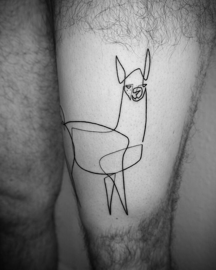 Single line tattoo of a llama on a person's leg, showcasing captivating tattoo art.