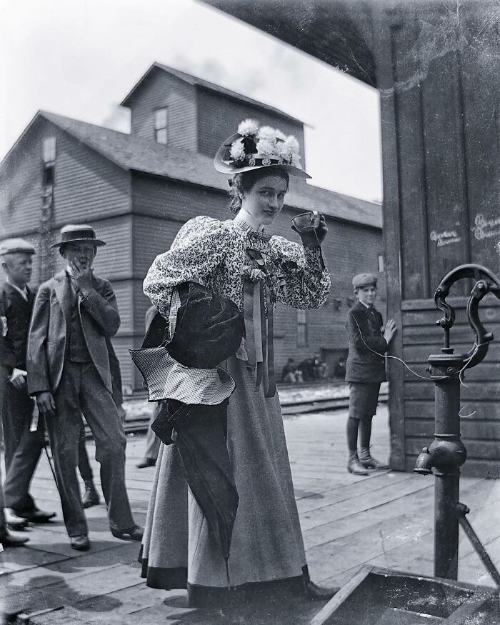 Woman Drinking From A Communal Cup At A Pump, 1899