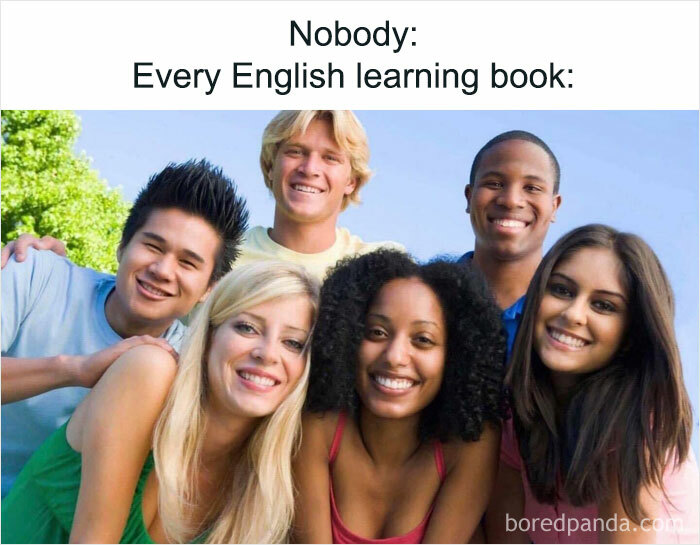 Smiling diverse students posing for a group photo, capturing funny student meme humor.