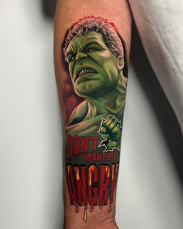 Marvel tattoo of the Hulk with "Don't Make Me Angry" text on a person's arm.