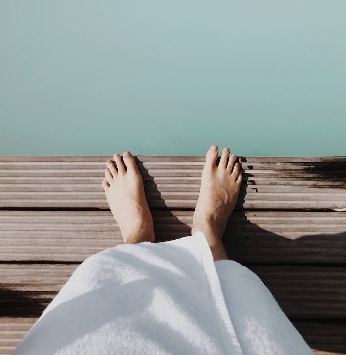 feet standing near water
