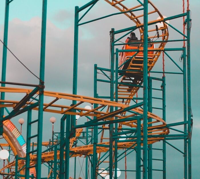 people riding a roller coaster