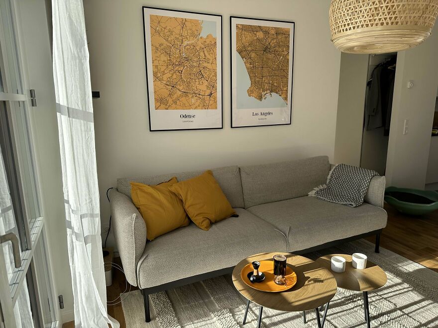 White living room with grey couch 