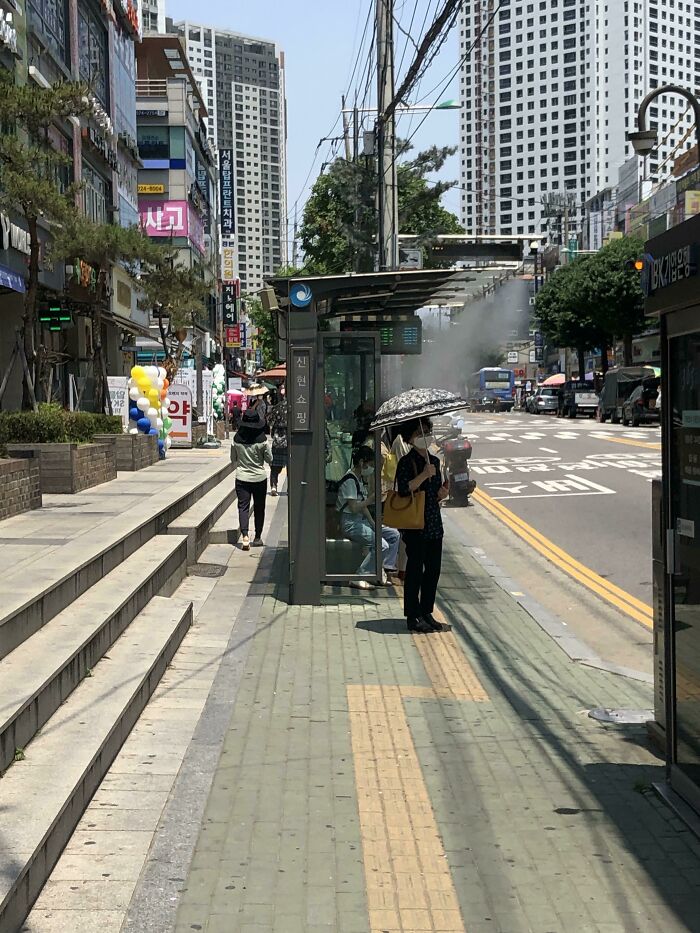 Bus Stop In Korea Spraying Mist During The Summer To Keep People Cool
