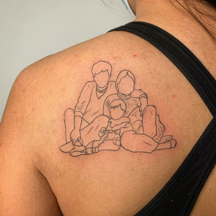 Family tattoo on shoulder depicting three figures, symbolizing unbreakable bonds.