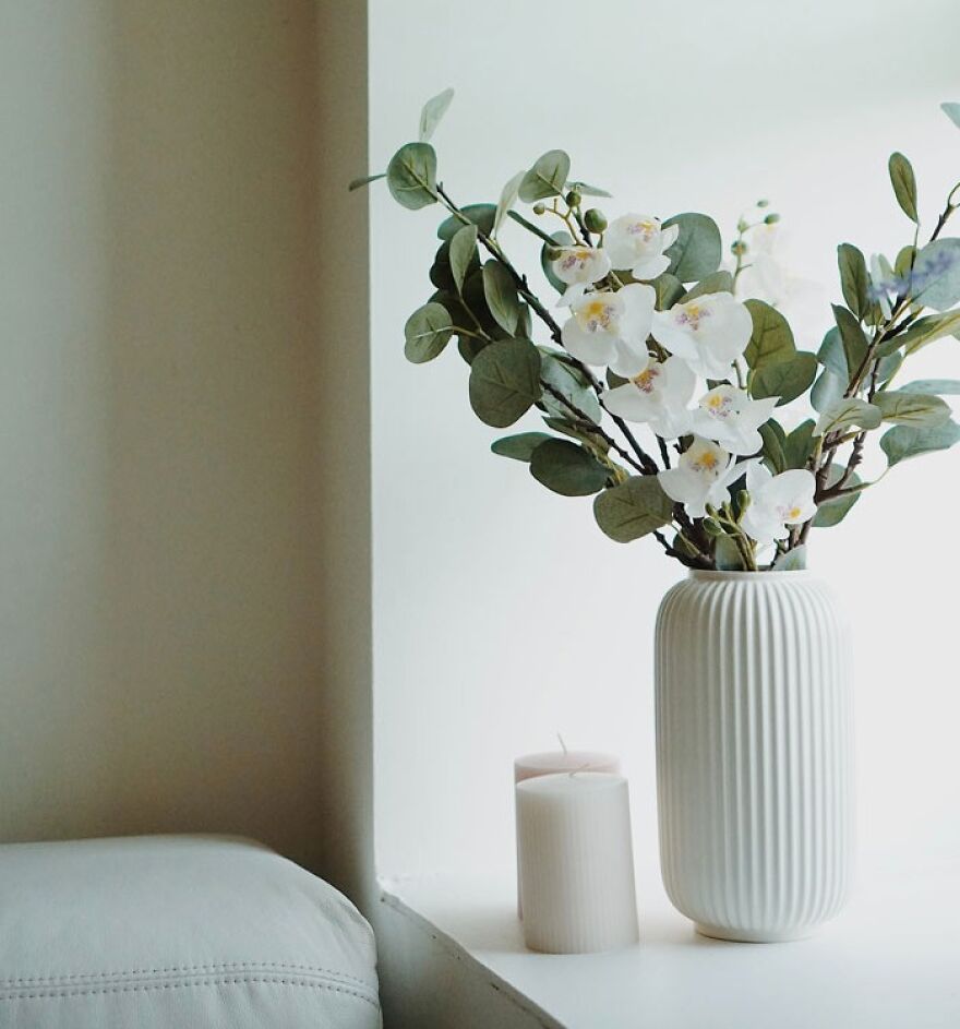 White vase with flowers 