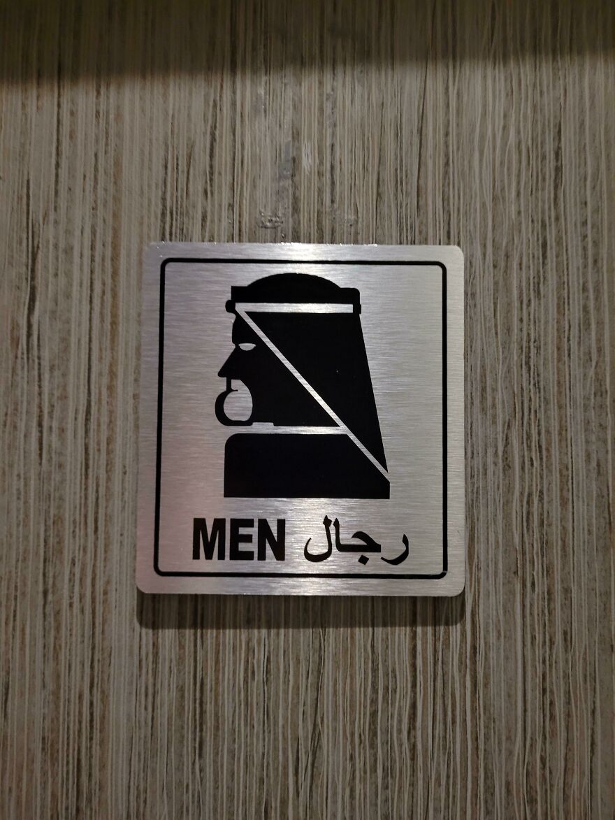 Weird looking bathroom sign in an airport 