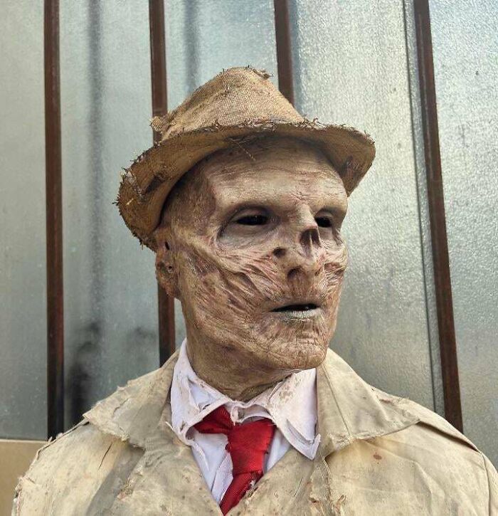 Person cosplaying Vault-Tec Rep from Fallout 4