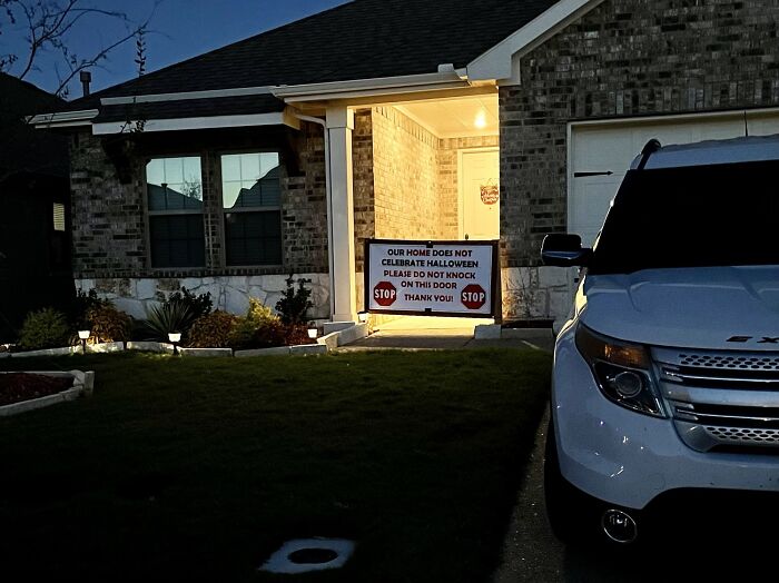 Our Neighbor Bought This Giant Sign Instead Of Turning The Light Off