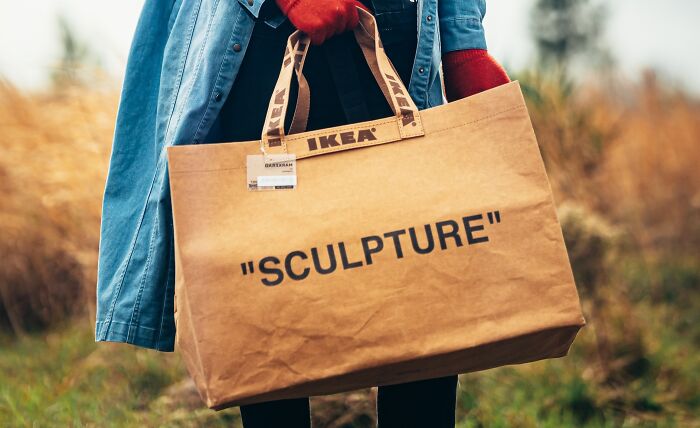 Person carries an IKEA bag 