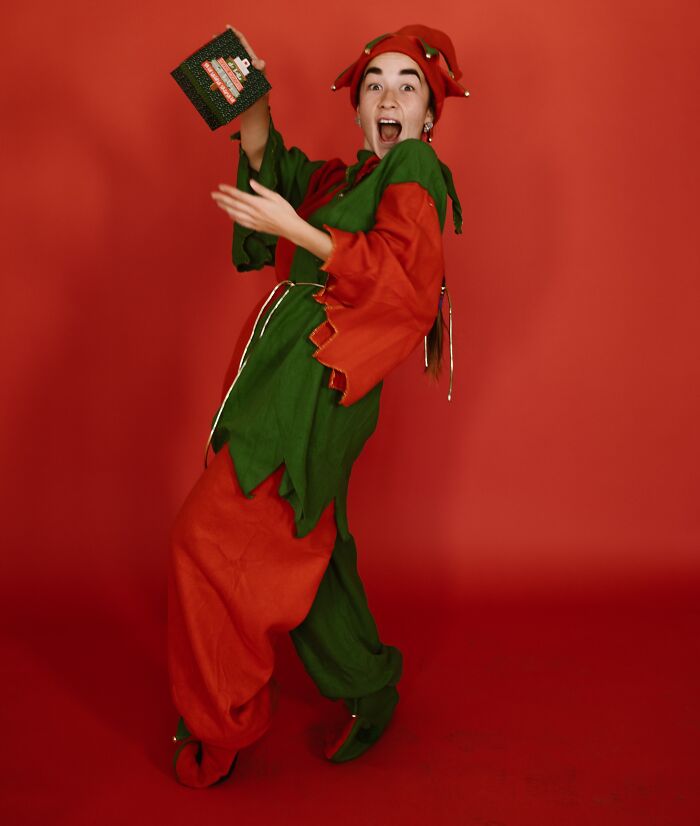 Happy Jester Holding A Box