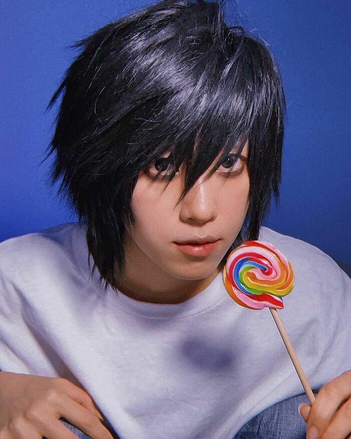 Person cosplaying L from Death Note