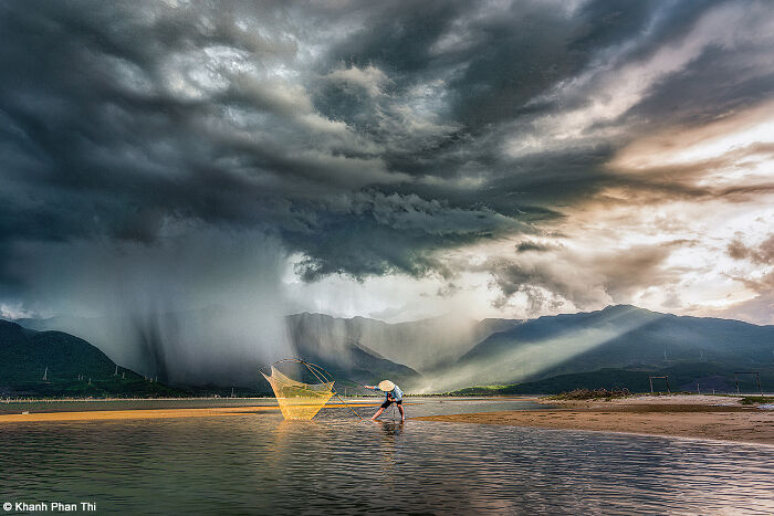 1st Place, Bring Home The Harvest: In The Storm By Khanh Phan Thi (Vietnam)