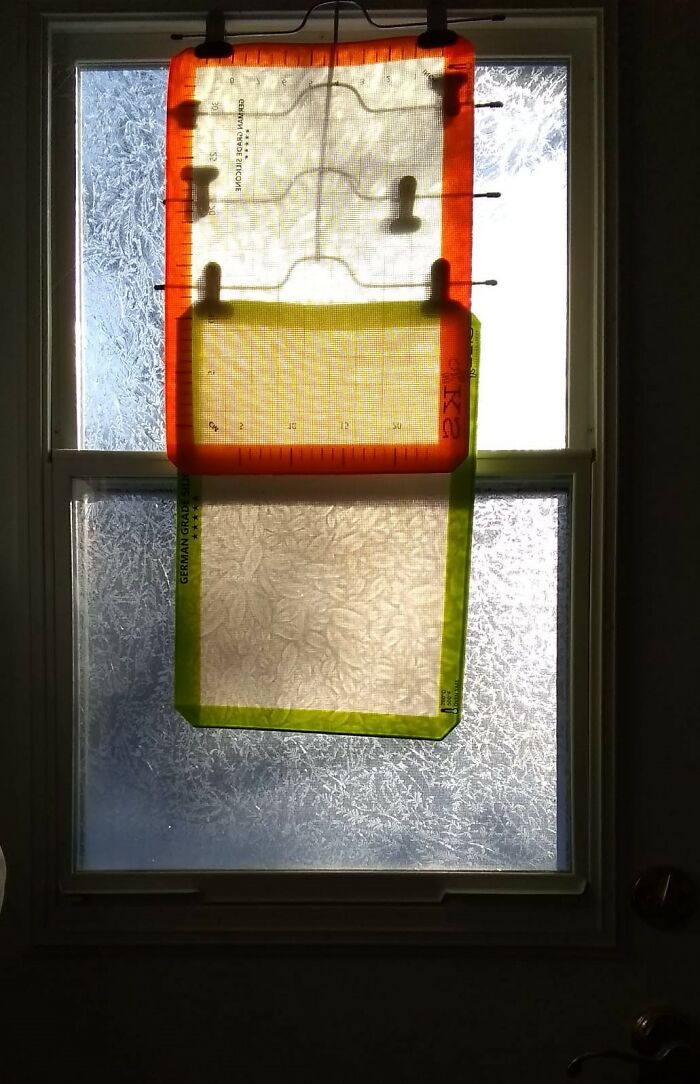 Two Birds With One Stone. I Keep My Silicone Mats Clipped On A Pant Holder In Front Of My Back Door; It's Easier Than Rolling Them In A Cupboard. It Also Blocks My Back Neighbor's Strong Light Coming Into My House And Blinding Me When I Come Up The Stairs (Right In Front)