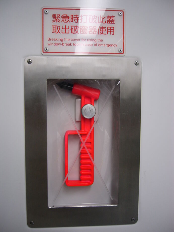 An escape tool under a glass 