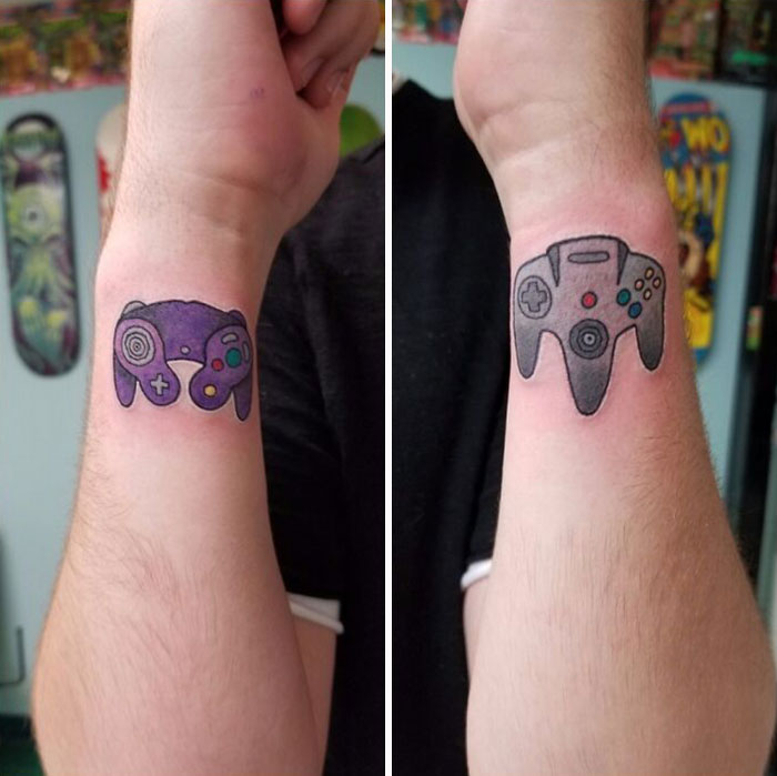 Wrist tattoo ideas featuring colorful game controller designs on forearms.