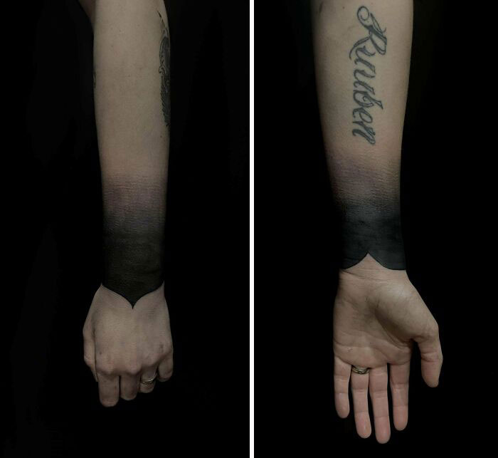 Wrist tattoo design with black gradient and script lettering on the forearm.