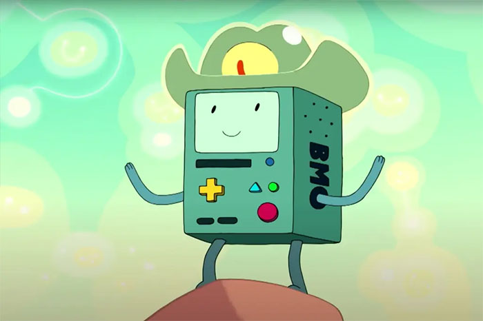 BMO from Adventure Time with hands raised, standing on a rounded surface, colorful abstract background behind.